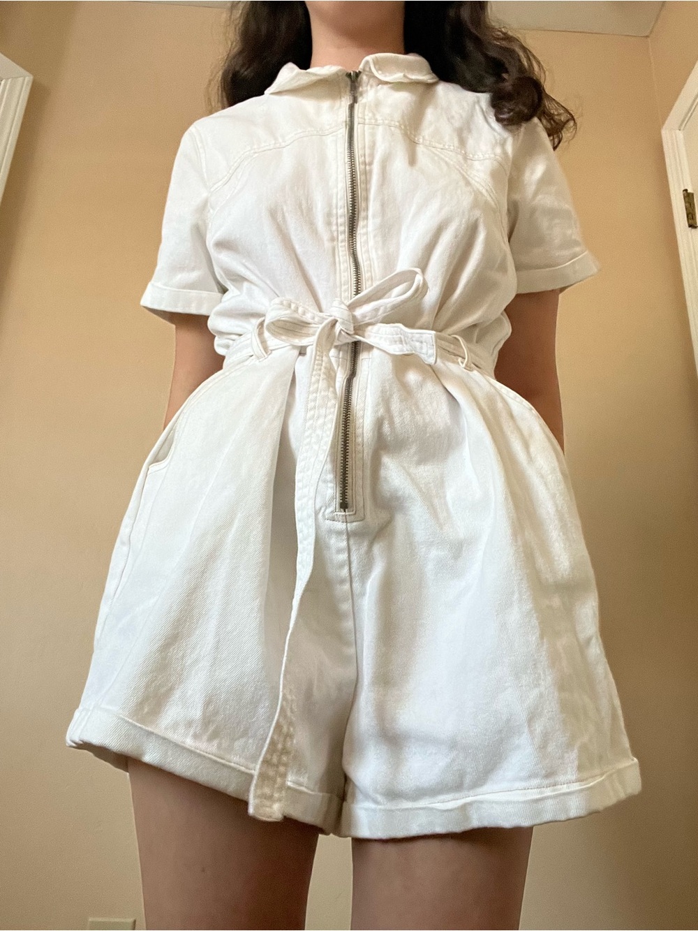 White zippered romper with tie waist